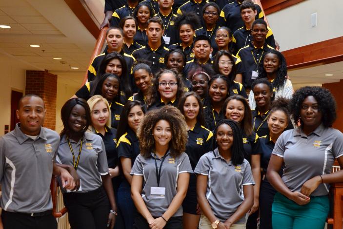 Image: 2015 Trulaske Business Academy student counselors with  high school students 