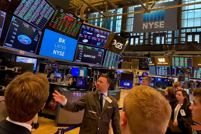 Masiello and students on trading floor