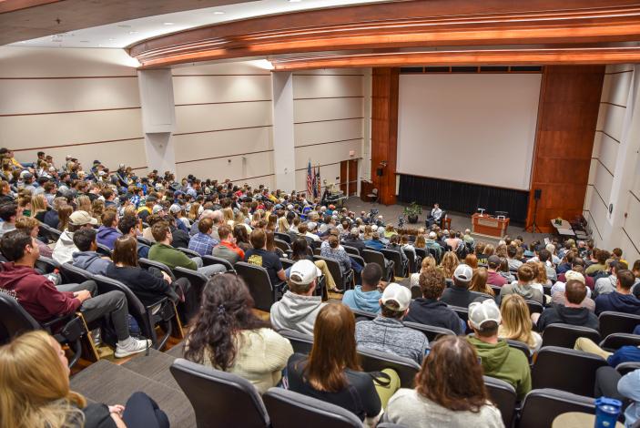 Tyler Shultz speaking in Cornell Hall