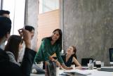 Image: Group of people laughing in the workplace