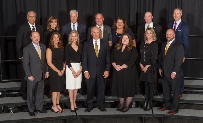 The 2019 Davenport Society Inductees and Advancing Members with Dean Ajay Vinze and Jeremy Diener.