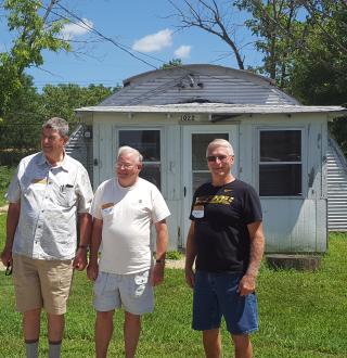 Jamie's father at a Quonsit hut